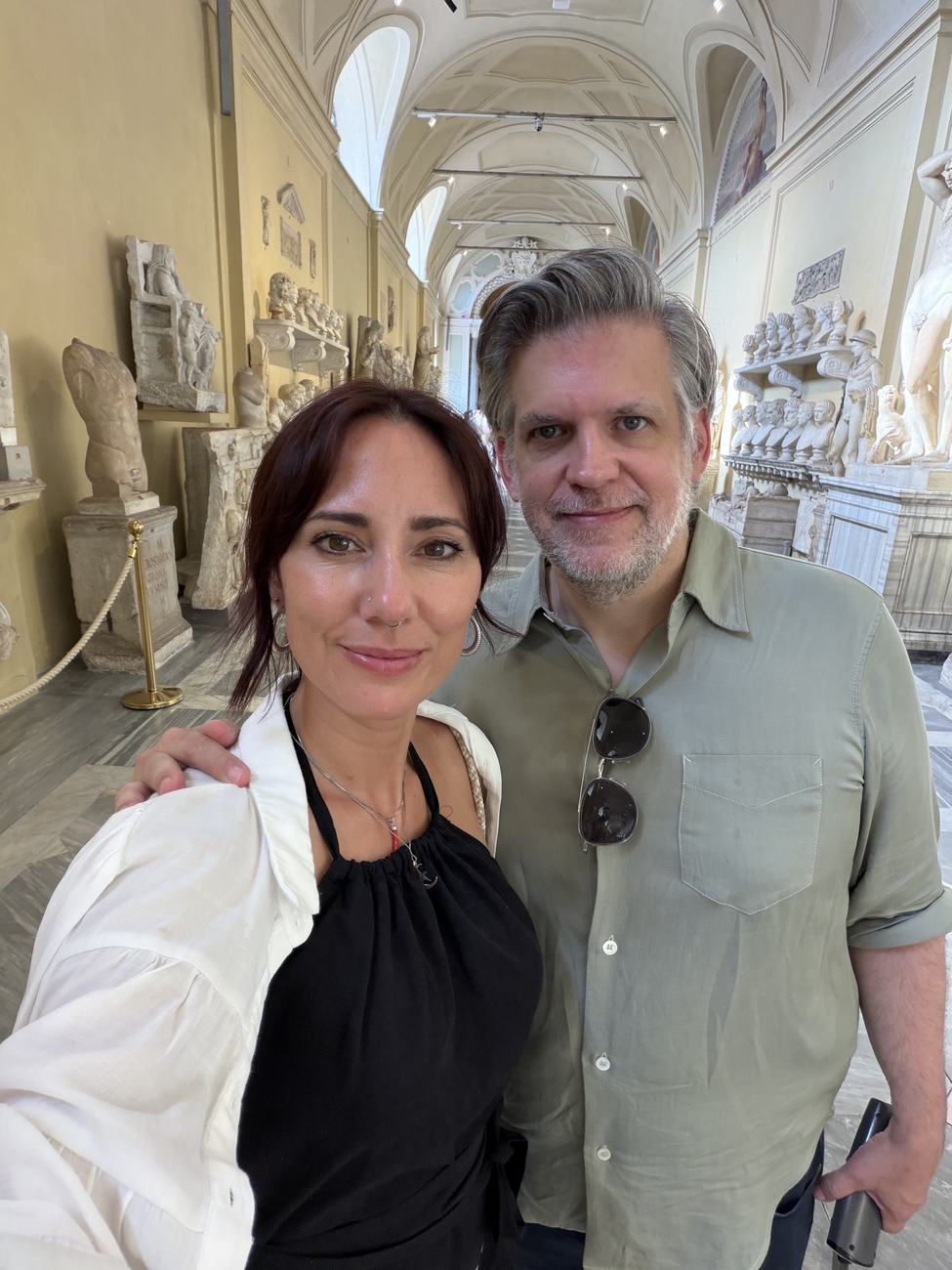 Danielle and Patrick in a gallery hall at the Vatican Museums